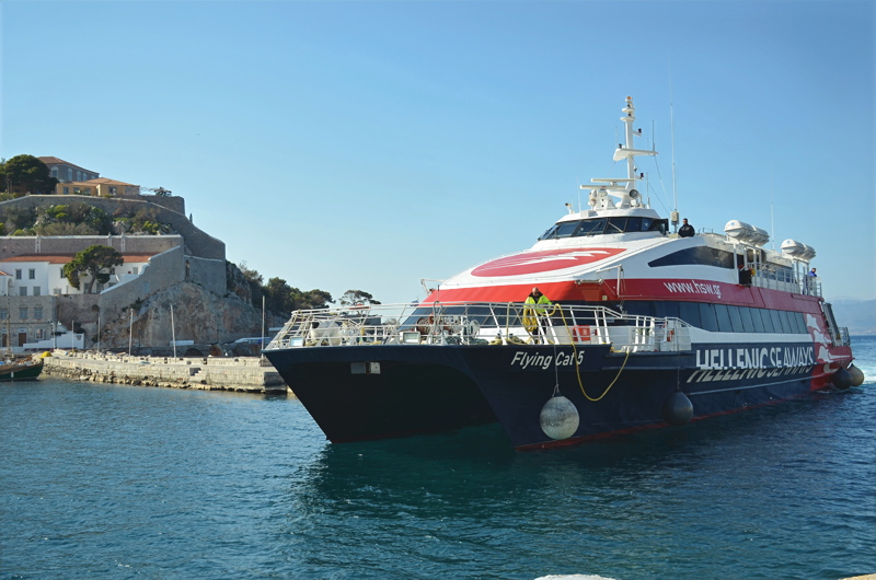 The Flying Cat 5, a high-speed passenger catamaran operated by Hellenic Seaways, arriving at the port of Hydra in the Saronic Gulf, Greece